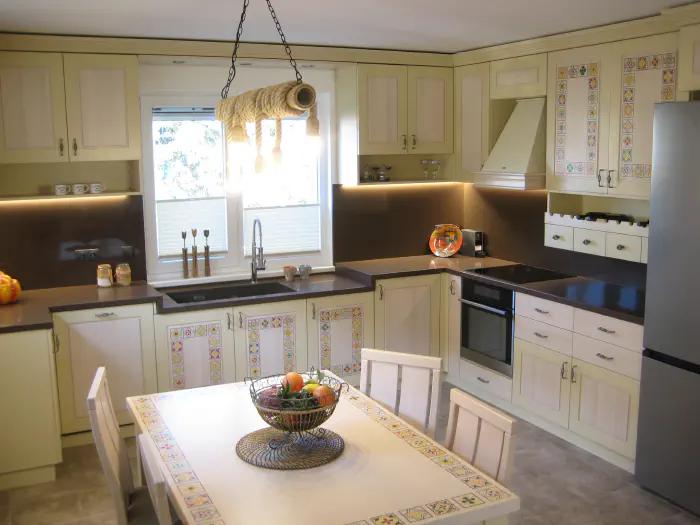 Visiting Deni's Home – two-level lime kitchen with painted details and a cleaner modern living room, photo 1